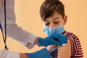 Pediatrician in Lake Jackson treating a child with high fever